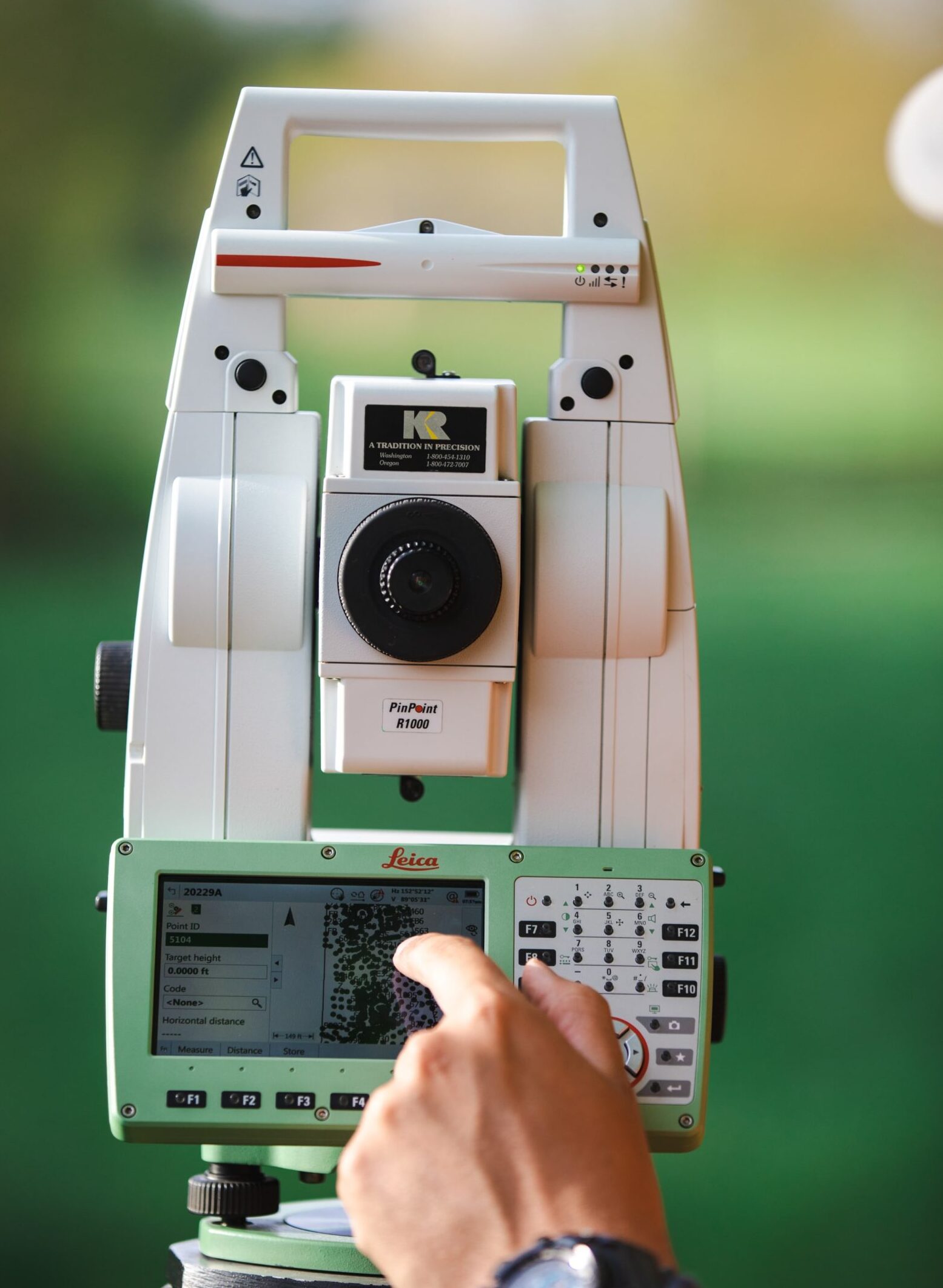 pointing at survey tool screen